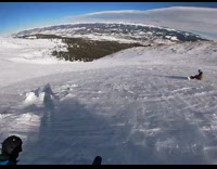 Guy skiing down mountain falls after trying to stop 