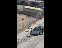 Woman throw water balloon on sport car