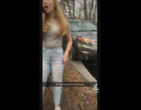 Girl falls while dragging car bumper 