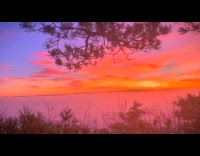 Man films beautiful orange sky