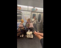 Woman with clown makeup ride subway train