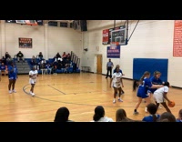 Basketball player does back bend to pass ball