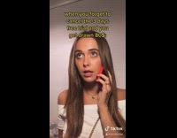 White shirt girl lip syncs red phone