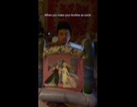 Man teasing niece with inflatable castle