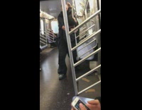 Two guys fight on train