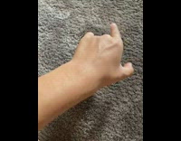 Vein move back of hand grey carpet