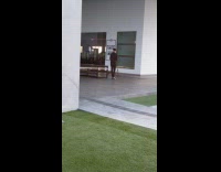 Guy black shirt take selfie outside building