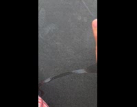 Guy shows hand foot and face print on trampoline