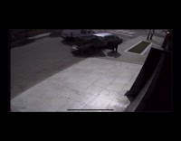 Car parked on street hit by trailer