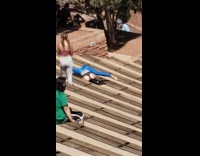 Woman blue yoga pants split legs stairs