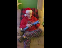 man receives black shirt cant stop laughing