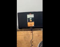 Man screen mirroring phone to tv creating loop