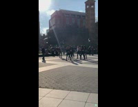 Girl group dances in town square park
