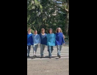 five guys wear blue knitted sweater together