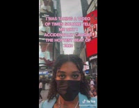 Girl in times square selfie catches drummer beat