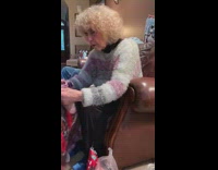 Grandma woman opening presents special custom blanket 