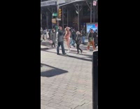 Naked cowboy with guitar walk on street