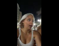 Woman interrupts video to tell friends her car is towed