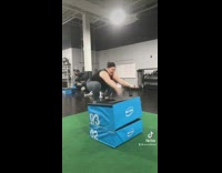 Woman does box jump but loses balance and falls forward