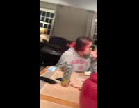 Collab BitchMP - Guy playing piano people watch around table