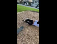 Guy goes down slide and falls