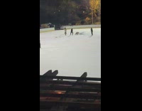 Ice skating rink employees skate into pile of ice 