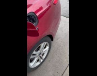 Man filling up gas car making strange noise 