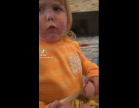 Little girl doesnt want to offer pink or lemon cookie