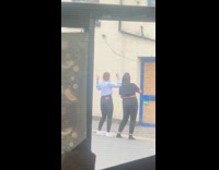 Two girls dance tiktok brown blue door