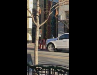 Woman white top jump alleyway graffiti boise