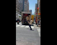 Collab Subway Creatures - Jolly Man Dances as he Waits on Crosswalk