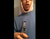 Black hat guy lights hair on fire