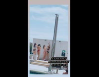 Woman with baby vs girls on shower