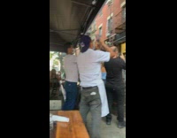 Girl catwoman guy black spiderman costume patio