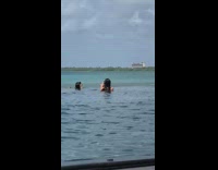 Two women swimming pool flex butt pictorial