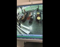 Security camera girl in black slips in restaurant