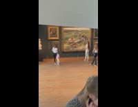 Woman pose in front of large painting