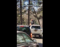 Guys block traffic for photo