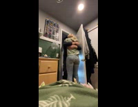 Woman surprises boyfriend hides behind the door