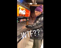 Guy purple beanie washes hands with soda fountain water