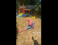 Woman does split while on spiderman costume 
