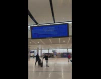 Airplane Ticket scan and travel information shows in the screen