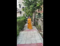 Slow motion video of woman in yellow dress