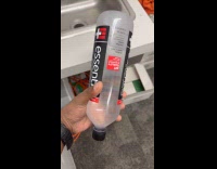Guy taps bottle water turned into ice