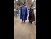 Woman films two guys dressed for Easter