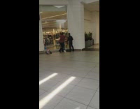 Lady gets caught shoplifting by security guards 