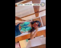 Girl makes butterfly top with table mat