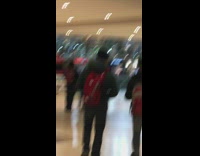 Collab Kook Of The Day - Guy carries surfboard through a mall