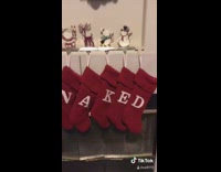 Girl rearranges stocking letter naked