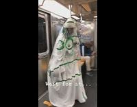 Person subway clear costume green tape stripes cover